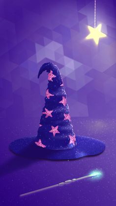 a purple hat with stars on it and a pen next to it in the foreground