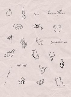 some drawings on paper with words and pictures in them, including an eyeball, cactus,