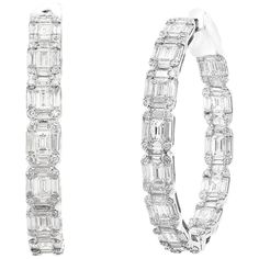 Gorgeous and classic diamond hoop earrings. Features dazzling baguette and round diamonds set in shared prongs to maximize the brilliance of the diamonds. Total weight of the Baguette Diamonds is 6.46 carat and Round Diamonds is 1.09 Carat. Made in 18k white gold. All diamonds are GH color SI1 Clarity. Available in Yellow and Rose Gold. Style available in different price ranges. Prices are based on your selection. Please contact us for more information. Luxury Classic Baguette Diamond Earrings, Baguette Earrings, Baguette Earring, Diamond Baguette, Round Diamond Setting, Baguette Diamonds, Diamond Hoop Earrings, Baguette Diamond, Jewelry Earrings Hoops