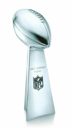 a silver trophy with a football on it