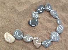 some rocks are arranged in the shape of a heart