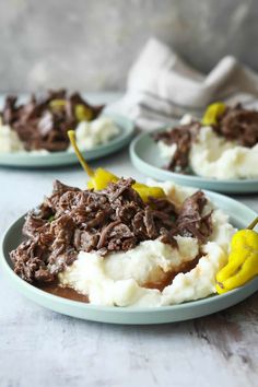 three plates filled with mashed potatoes and beef