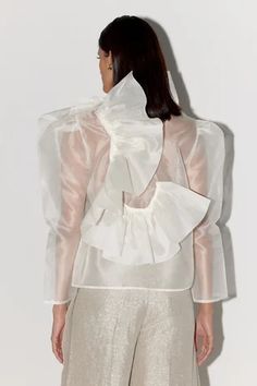 Shop for FEBo6 White Silk Organza Swan Layered Ruffle Top for Women Online at Aza Fashions Party Tops With Sheer Sleeves In Silk Chiffon, Party Silk Chiffon Tops With Sheer Sleeves, Silk Chiffon Tops With Sheer Sleeves For Parties, Fitted Silk Chiffon Top With Sheer Sleeves, Formal Organza Blouse With Ruffles, Chic Organza Blouse With Sheer Sleeves, Sheer Organza Tops For Wedding, Sheer Organza Wedding Tops, Feminine Sheer Organza Top