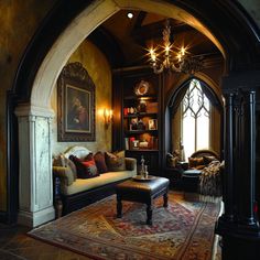 a living room filled with furniture and a chandelier