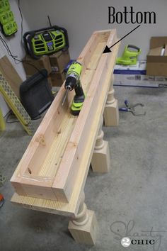 a drill is being used to build a bench