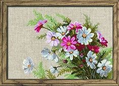 a cross stitch picture with some flowers in it