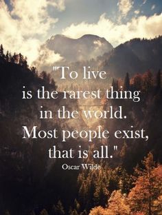 the quote to live is the rarest thing in the world most people exit, that is all oscar wilde