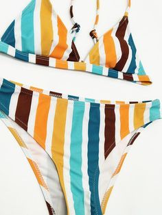 Sku CY-!20087 Material Polyester Style Padded , Bralette Feature Printed , Striped Occasion Beach , Swimming Pool Type Bikinis Swimwear Color STRIPES Size S,M,L Size chart: Please consult the size chart we provide for this item's measurements to help you decide which size to buy. Please note: There may be 1-3cm differ due to manual measurement. Inch Under Bust Grith Waist Hips S 28.35 26.77-29.13 30.71-37.01 M 29.92 29.13-30.71 32.28-38.58 L 31.50 30.71-32.28 33.86-40.16 Striped Triangle Top Swimwear For Summer, Multicolor T-back Summer Swimwear, Multicolor Tankini For Summer Surfing, Striped Halter Neck Summer Swimwear, Multicolor Tankini For Surfing Beach Season, Retro Triangle Top Swimwear For Beach, Striped Stretch Triangle Top Swimwear, Multicolor Triangle Top Swimwear For Surfing, Trendy Striped Swimwear For Beach Season