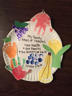 a paper plate with some handprints on it that says, my family made of thanks our health the country we live in