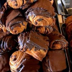 chocolate covered pastries piled on top of each other