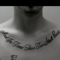 a man's chest with an inscription on it that says, don't time this too shall pass