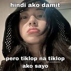 a woman wearing a hoodie with the caption'hindi ako damit '