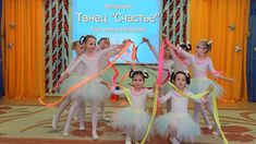 the children are posing with their ribbons in front of a projector screen that says tahelu'chactee