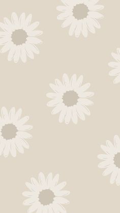 a white flower pattern on a beige background