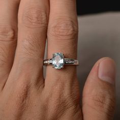 This is a gorgeous handmade creation. Its beauty is its simplicity & Elegance. The 7*9 mm oval shape faceted natural aquamarine is crafted in solid sterling silver and with rhodium plated. All item is sent in a beautiful gift box If you have any idea of design your ring,pls contact me directly. You can realize more lovely stuff clicking the link https://www.etsy.com/shop/knightjewelry?refshopsection_shophome_leftnav Please leave the correct address and you phone number for delivering success Oval Cut Wedding Ring, Garnet Wedding Rings, Orange Gem, March Birthstone Ring, June Birthstone Ring, Aquamarine Ring, March Birthstone, Ring Blue, Aquamarine Rings