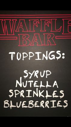 a chalk board with writing on it that says waffle bar topings syrup nutella sprinkles blueberries