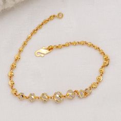 Please click -- Learn more about this item -- below for a full description 22k gold chain bracelet chain handmade jewelry made in India 22k yellow gold chain bracelet handmade jewelry for women Pretty gift for women, Indian gold 22kt jewelry Christmas Present  length is 6.5 Inch approx.  width is 5.5/2 millimeter approx.   weight is 4.76 grams approx. please message me if you have any query.                                      Returns & exchanges & Cancellations              If any return or Ca Gold Bracelet Chain Women, Gold Bracelets For Women Indian, Bracelets Gold Simple For Women, 22k Gold Bracelet, 22k Gold Chain, Bracelet For Women Gold, New Gold Jewellery Designs, Gold Earrings Models, Gold Chain Bracelet