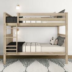 a wooden bunk bed sitting on top of a white rug