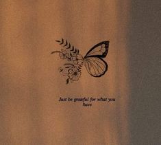 a butterfly with some flowers on it's back and the words just be grateful for what you have