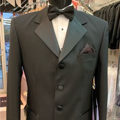 Long Style 4 Button Notch Tuxedo Jacket. 100% Tropical Wool. Non-Vented Besom Pockets. Mint Condition. Vintage After Six Semi-formal Tuxedo Outerwear With Pockets, Black Business Tuxedo With Pockets, Formal Tuxedo Outerwear With Buttons, Elegant Tailored Sport Coat With Buttons, Black Single Breasted Outerwear For Wedding, Black Single-breasted Outerwear For Wedding, Tuxedo Style Blazer With Button Closure, Formal Tuxedo Blazer With Button Closure, Black Tuxedo With Pockets For Semi-formal Occasions