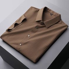 Our classic intricate striped shirt is enriched with anti-wrinkle technology for a clean finished look every wear. This lightweight, breathable button shirt guarantees a comfortable and refined experience, accentuated by the subtle charm of its button line-up—a true testament to tasteful elegance. Click on "ADD TO CART" to SAVE 50% OFF TODAY - Get yours now! Details: 2023 Release Timeless striped pattern that adds a touch of sophistication to the fabric Enhanced with advanced anti-wrinkle techno Elegant Business Top With Wrinkle-resistant Fabric, Elegant Business Tops Wrinkle-resistant, Elegant Wrinkle-resistant Business Top, Elegant Collared Shirt With Wrinkle-resistant Fabric, Elegant Pinstripe Shirt For Business, Semi-formal Wrinkle-resistant Collared Shirt, Elegant Striped Summer Dress Shirt, Wrinkle-resistant Collared Business Shirt, Elegant Striped Short Sleeve Shirt