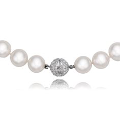 This exceptional necklace puts on display thirty-five round shaped South Sea pearls, each individually knotted and graduating in size. They range from 11.00mm to 13.50mm in diameter and have a white body colour with pinkish and greenish overtones. The white gold ball clasp is a feature, in itself, with its one hundred and eight round brilliant cut diamonds totaling 1.35 carats (clarity: I-1; colour: H-I). The clasp comes together with a threaded post that screws into the opposite side for a seam Formal White Jewelry With 8mm Beads, Elegant White Pearl Necklace With 8mm Beads, Formal White Pearl Necklace With 8mm Beads, Elegant White Necklace With 8mm Beads, Elegant White Necklaces With 8mm Beads, Formal White Necklace With 8mm Beads, White Formal Necklaces With 8mm Beads, White Necklaces With 8mm Beads For Formal Occasions, Classic Diamond White Necklaces With Pearl Charm