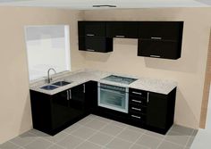 an empty kitchen with black cabinets and white counter tops