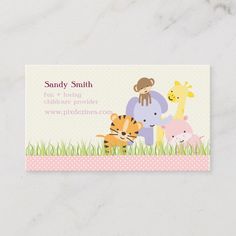 a business card with an elephant, giraffe and baby animals on the front