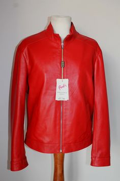 ITALIAN BEAUTIFUL  LEATHER JACKET , FERRARI RED COLOR ! MADE WITH VERYYYY SOFT  LAMBSKIN  LEATHER  SIZE : L  (italian)  SLIM FIT  , FOR MORE DETAILS OF THE MEASUREMENTS PLEASE CHECK THE PICTURE OF THE BACK.(#4) MADE IN ITALY  (VERA PELLE)   We've done our best to represent our true colors but due to the differences in screen resolution for computer monitors, colors can vary slightly. MATERIAL  All our skins are tanned in  Solofra Italy, the town of 200 lambskin tanneries. We Guaranty 100% the qu Ferrari Red, Men Fits, Red Jacket, Lambskin Leather, Red Leather Jacket, Vest Jacket, Russia, Mens Accessories, Leather Jacket