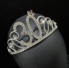 a tiara with the number 100 on it