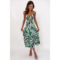 Step into the tropics with our Sundress for Spring/Summer, featuring a Leaves Tropical Floral Print and a Fresh Sweet Tie-Neck Strap Design. This chic ensemble seamlessly blends the beauty of tropical florals with a charming tie-neck strap dress silhouette. Crafted for comfort and style, this sundress is perfect for various occasions. Whether you're strolling on the beach or attending a summer event, the tropical floral print adds a touch of freshness and elegance. Embrace the vibrant and sweet vibes of the season with this must-have piece that effortlessly combines tropical florals, a tie-neck strap, and a sundress silhouette for a chic and playful ensemble. Tropical Print V-neck Midi Dress For Garden Party, Tropical V-neck Sundress For Brunch, Summer Tropical Print Midi Dress For Day Out, Summer Tropical Print Midi Sundress, Summer Midi Sundress With Tropical Print, Green Tropical Print Summer Midi Dress, Summer Printed Sundress For Brunch, Green Tropical Print Midi Dress For Vacation, Green Dress For Brunch And Vacation