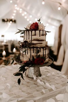 a wedding cake sitting on top of a table