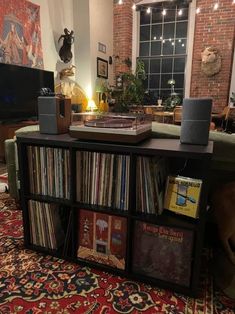 a living room filled with lots of records