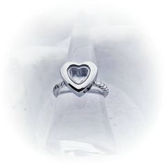 Heart Cremation Ring - Fillable Locket Ring - Heart Urn Ring Cremation Jewelry -Dad Memorial Ring- Child Loss Ring -Mom Memorial Jewelry- Twisted The heart cremation ring has a small screw at the bottom of the heart so you can fill it with your loved one's ashes. The twisted rope band offers comfort as well as fashion. Thos ring is stainless steel and will never tarnish or turn your skin green. The ashes can move around freely or you can fill it completely so they do not move. The ashes can be s Adjustable Heart Ring For Promise And Mother's Day, Adjustable Heart Ring For Promise On Mother's Day, Heart-shaped Birthstone Ring For Mother's Day, Hypoallergenic Silver Heart-shaped Ring, Adjustable Heart-shaped Birthstone Ring For Valentine's Day, Adjustable Heart Cut Ring For Valentine's Day, Adjustable Heart Ring For Anniversary On Mother's Day, Adjustable Heart Ring For Anniversary And Mother's Day, Valentine's Day Adjustable Heart Birthstone Ring