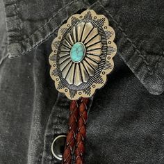 Sun Flower Turquoise Concho Southwestern Bolo Tie | Yellowstone Spirit Southwestern Collection Turquoise Necklace Objects of Beauty Handmade Bohemian Bolo Tie For Rodeo, Handmade Bohemian Bolo Ties For Western-themed Events, Bohemian Handmade Bolo Ties For Western-themed Events, Handmade Bohemian Bolo Ties For Western Style, Bohemian Concho Bolo Ties For Rodeo, Bohemian Bolo Tie With Concho, Bohemian Silver Handmade Bolo Tie, Handmade Silver Bohemian Bolo Ties, Bohemian Silver Bolo Ties For Western-themed Events