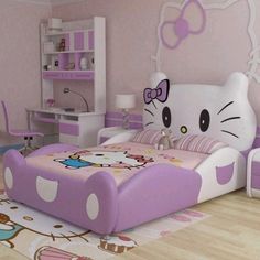 a hello kitty themed bedroom with pink walls