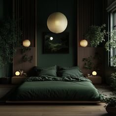 a bed with green sheets and pillows in a dark room next to two potted plants