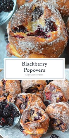 blueberry popovers with powdered sugar on top and berries in the middle, surrounded by other pastries