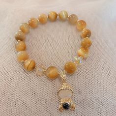 Be grateful for all the good things in life and truly enjoy every moment. Use this "Smile • Tiger's Eye Crystal Bracelet" to remind yourself how lucky you are, and never forget to acknowledge and appreciate the simplicity and beauty of everyday life.

Natural tiger's eye, crystal, jade
Bead diameter: 8 mm
Premium zinc alloy
Elastic - Suitable for hand circumference: 14-18 CM
Hypoallergenic, lead & nickel free


*We carefully select each gemstone to offer gems with the best quality. As gemstones Crystals Tigers Eye, Tiger Eye Gemstone, Tiger's Eye Crystal, Tiger Stone Bracelet, Tiger Eye Crystal, Lucky You, Air Jordan Sneakers, Eye Stone, Tiger Eye Bracelet