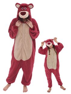 two people in animal onesuits standing next to each other