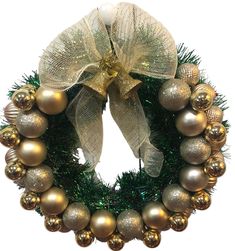 a christmas wreath with gold and silver ornaments