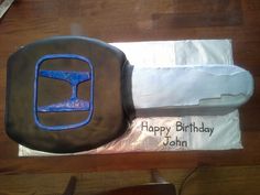 a birthday cake that is shaped like an airplane