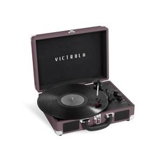 an open suitcase with a record player in it's lid and the word victoria printed on its side