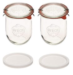 two glass jars with lids are shown next to each other