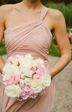 a woman in a dress holding a bouquet of flowers on her wedding day with the caption pint