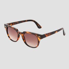 For a cool, classic touch to your outfits, accessorize with these Tortoise Shell Print Narrow Rectangle Sunglasses from Universal Thread™. In a rectangular shape, these plastic-frame sunglasses feature a tortoise-shell print with brown lenses to suit your style for the day. The UV-protection design of the lenses helps keep your eyes shielded, while the hinged temples allow easy folding for convenient storage. Complete with nose pads for comfortable wear, these shatter-resistant, brown sunglasses