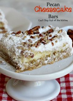 a piece of pecan cheesecake bars on a white plate with a red and white checkered tablecloth