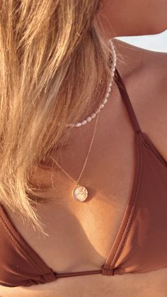 Stunning gold sun and natural shell pendant on a gold plated or gold filled chain. Necklaces are 16 inches in length with a 2 inch extender. Dainty 14k Gold Filled Medallion Jewelry, Dainty 14k Gold-filled Medallion Jewelry, Dainty Medallion Necklace In 14k Gold Filled, Gold Charm Necklaces With Pearl Pendant, 14k Gold Filled Pearl Necklace, Rose Gold 14k Gold-filled Necklace With Pearl Pendant, 14k Rose Gold Filled Necklaces With Pearl Pendant, 14k Gold Filled Pearl Charm Necklace, 14k Gold-filled Necklace With Pearl Charm