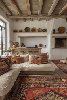 a living room filled with lots of furniture and decor