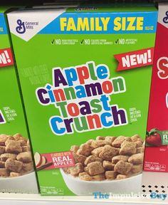 three boxes of apple cinnamon toast crunch cereals on the shelf in a grocery store